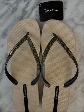 Ipanema Women's Beige Flip Flop Sandals with Black Glitter Straps